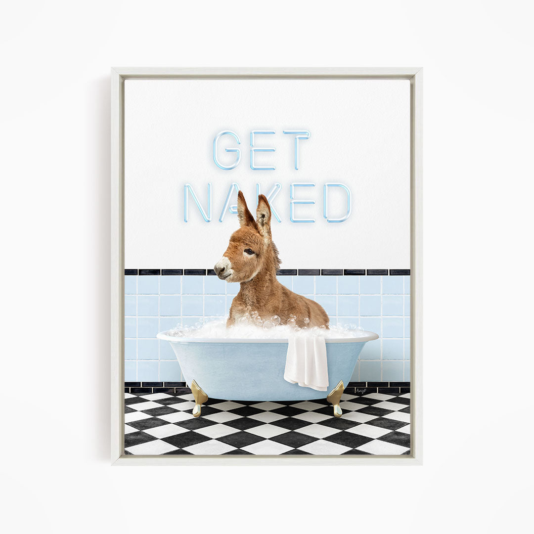 A donkey is sitting in a bathtub filled with bubbles, with the text "GET NAKED" displayed above it.