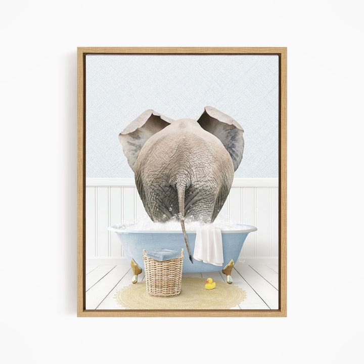A gray elephant is standing in a blue bathtub filled with water, surrounded by rubber ducks and a basket.
