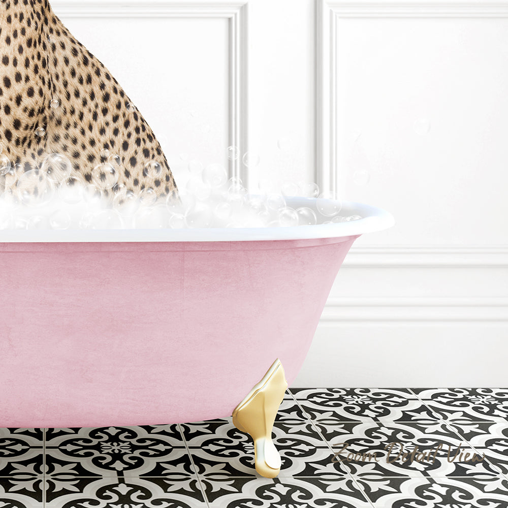 A pink clawfoot bathtub filled with bubbles, with a leopard print pattern on the wall behind it.
