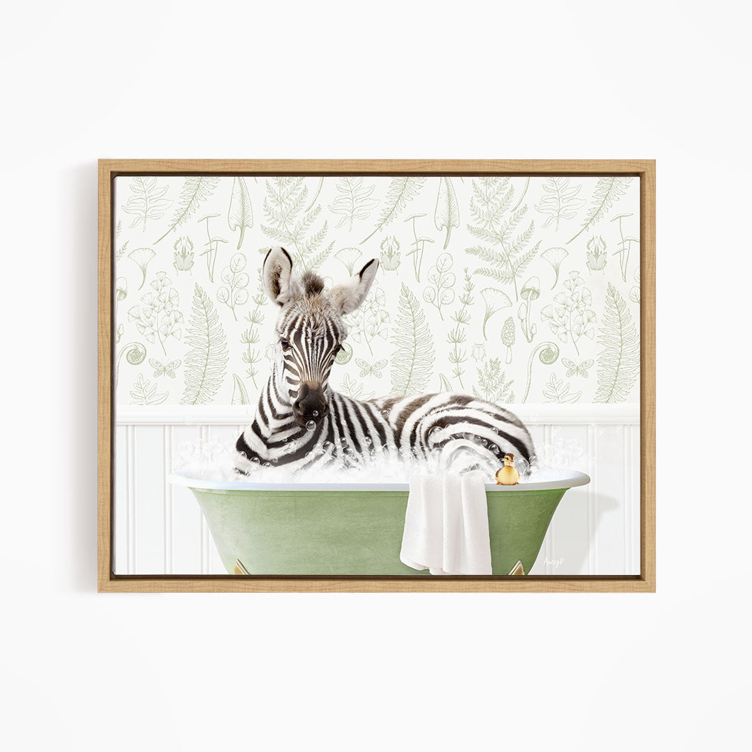 A zebra is sitting in a green bathtub, surrounded by a white and green floral patterned wall.