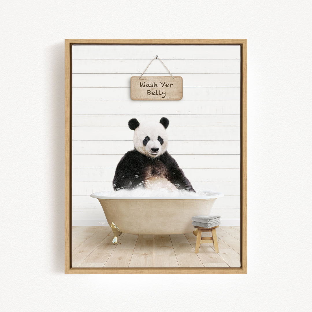 A panda bear sitting in a bathtub, with a sign above that says "Wash Your Belly".