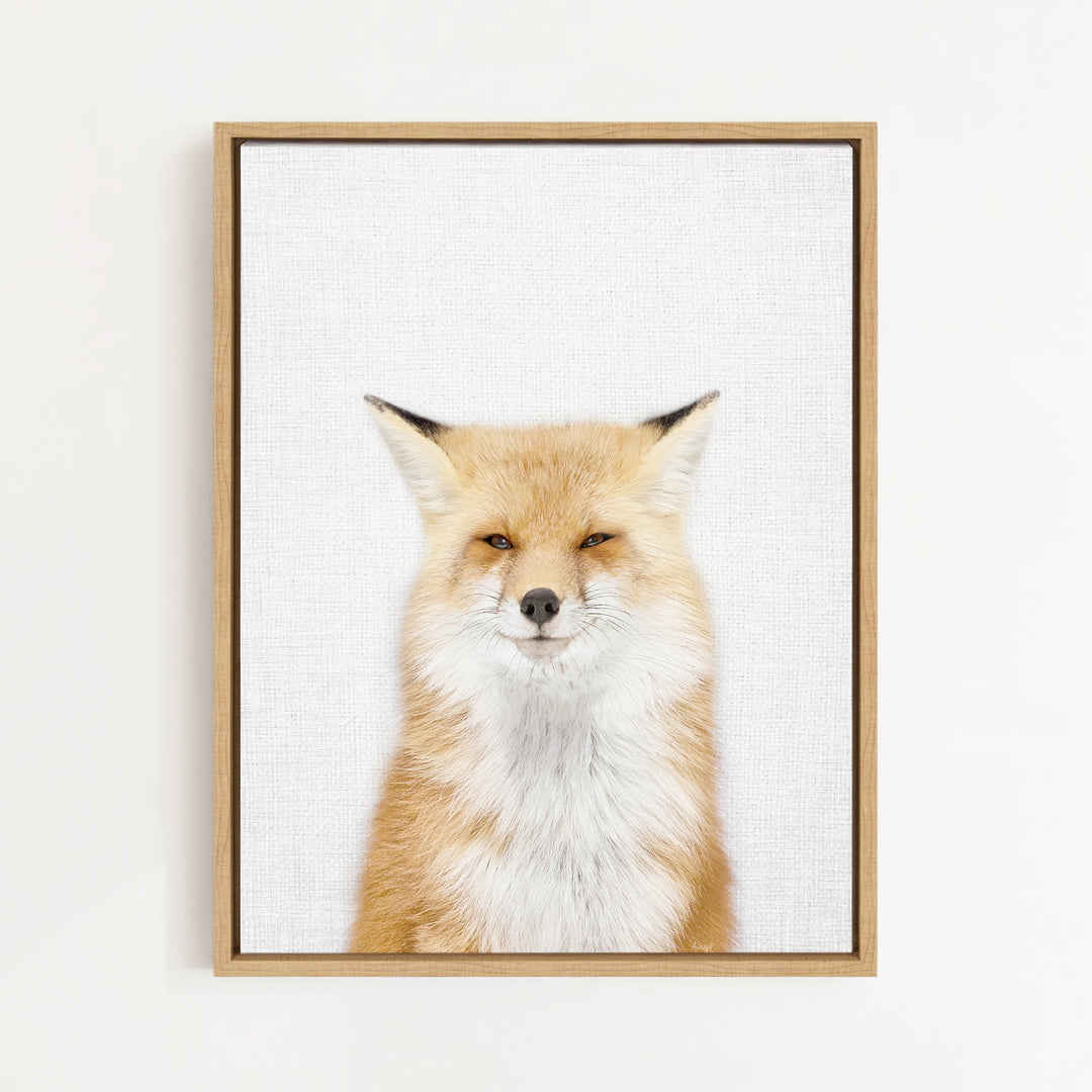A framed print of a smiling fox with a white background.