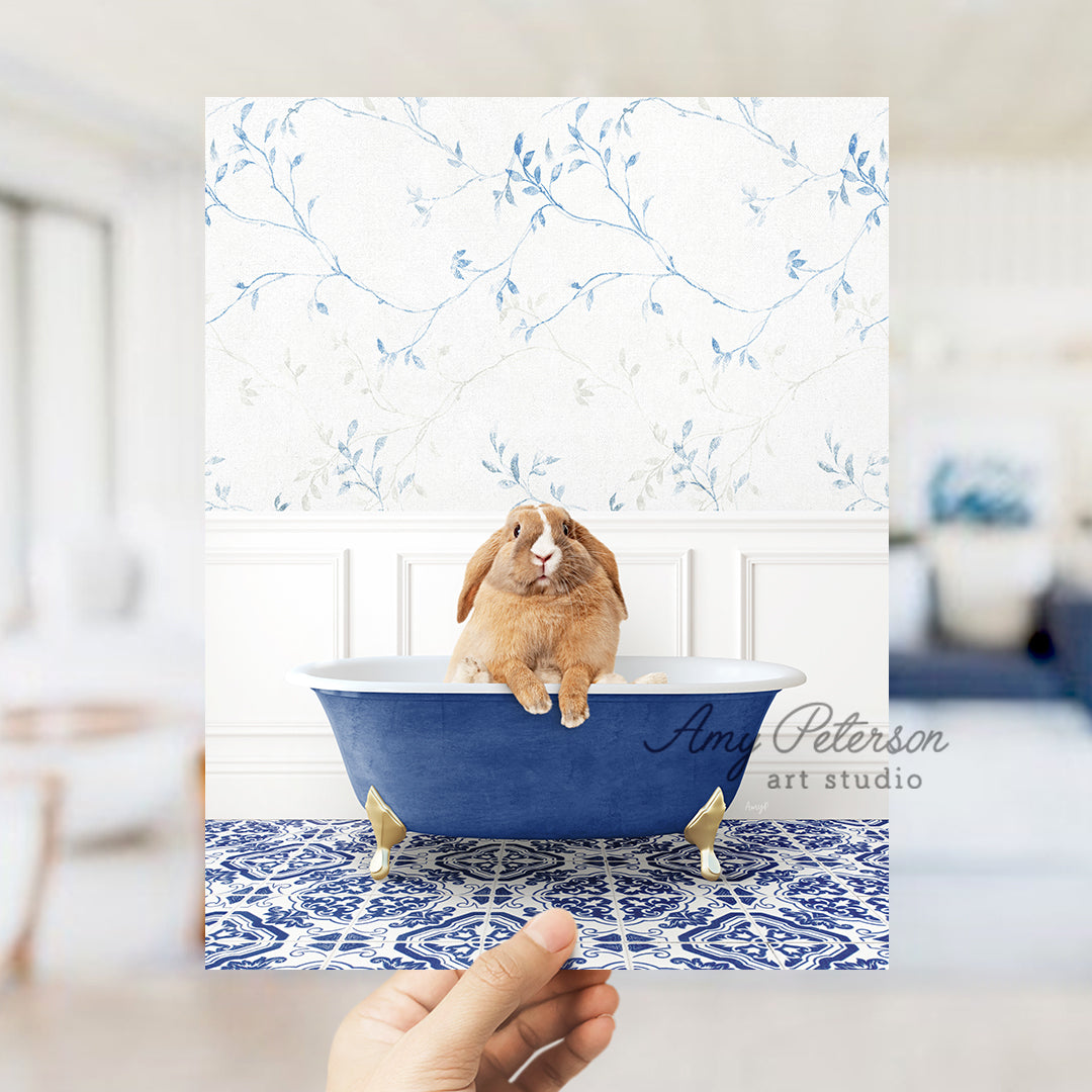 a person holding a card with a picture of a rabbit in a bathtub