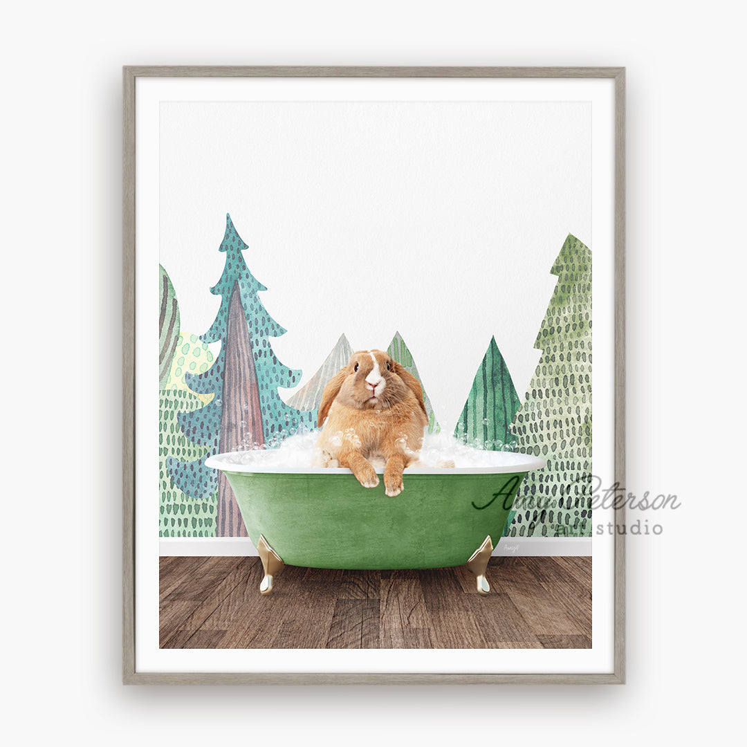 a dog sitting in a green bathtub with pine trees in the background