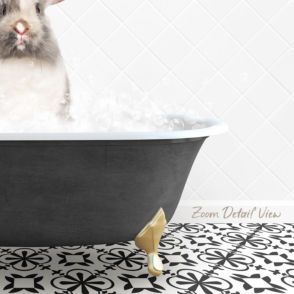 A small rabbit is sitting in a bathtub filled with bubbles, with a patterned tile floor in the foreground.