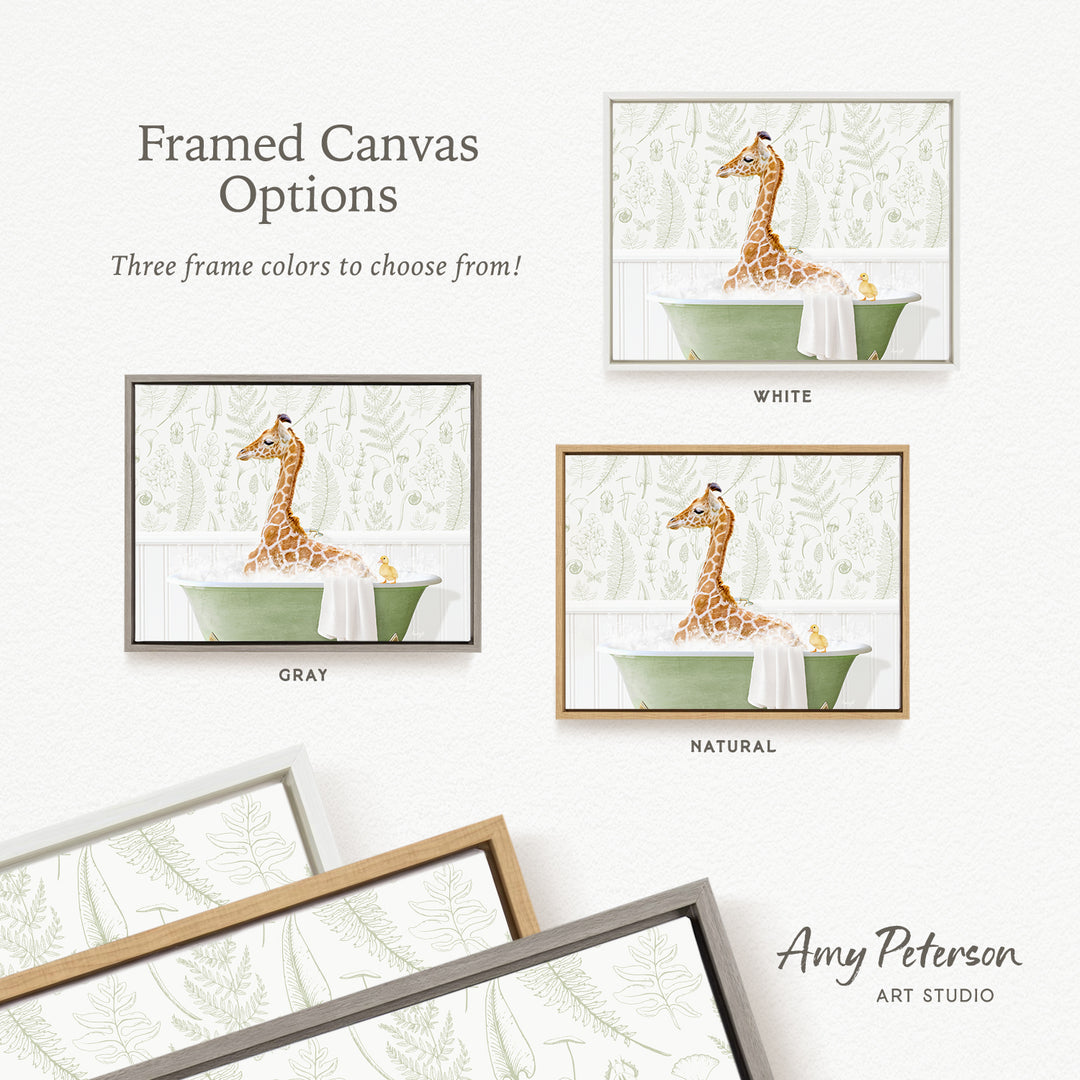 The image is a framed canvas with three different frame colors to choose from: white, gray, and natural. The canvas features a giraffe sitting in a green bathtub, with a towel draped over it.