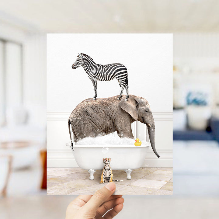A zebra standing on an elephant's back while both animals are in a bathtub filled with bubbles.