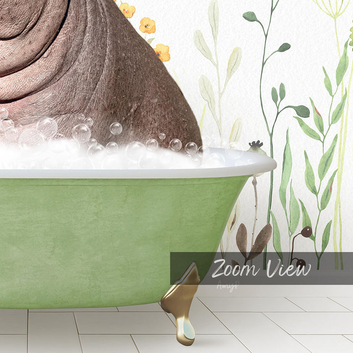 A green bathtub filled with bubbles, with a plant-like decoration on the wall behind it.
