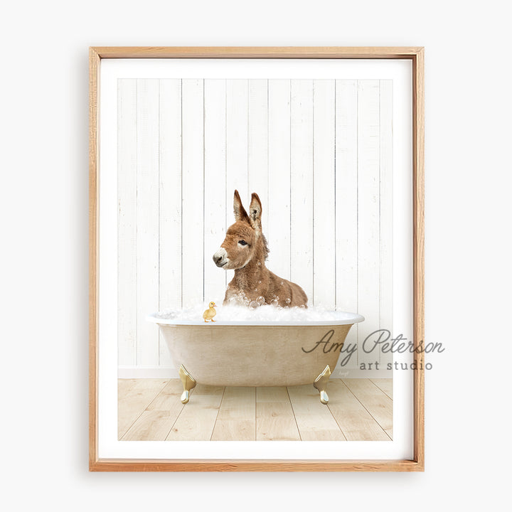 a dog sitting in a bathtub with a white wall behind it