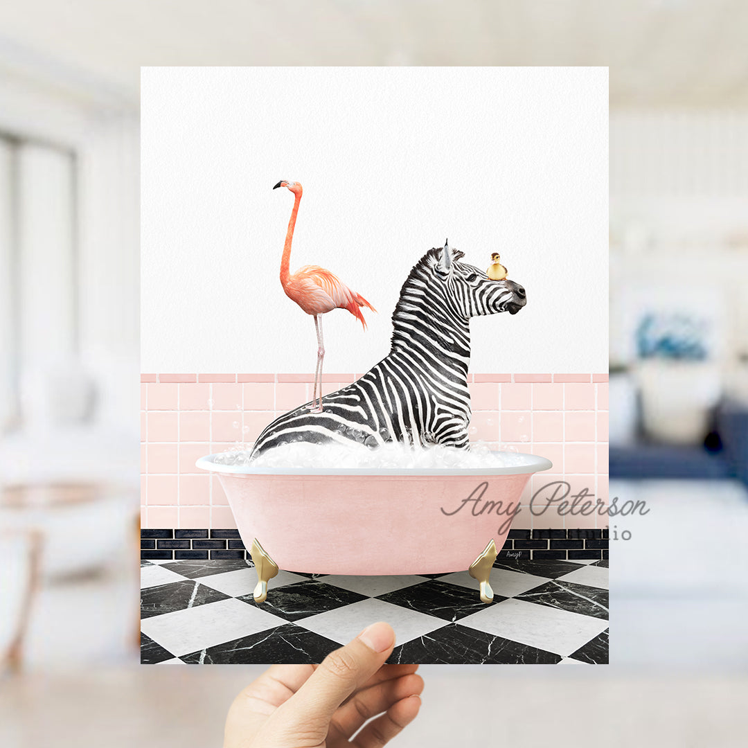 a person holding a card with a zebra and a flamingo in a bathtub