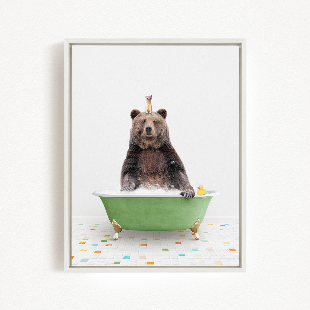 A brown bear sitting in a green bathtub, surrounded by colorful tiles on the floor.