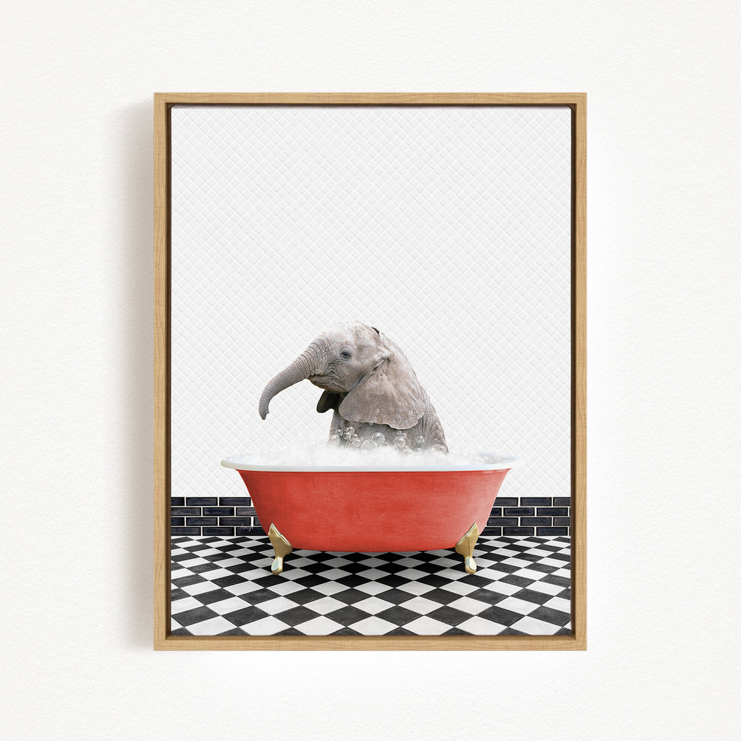 A baby elephant sitting in a red bathtub filled with water, surrounded by a black and white checkered floor.