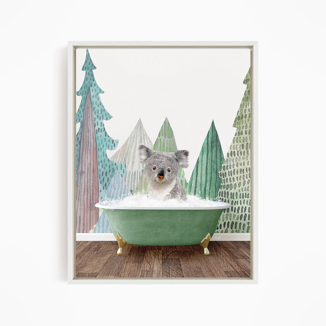 A koala bear sitting in a green bathtub, surrounded by a forest scene with trees and snow.