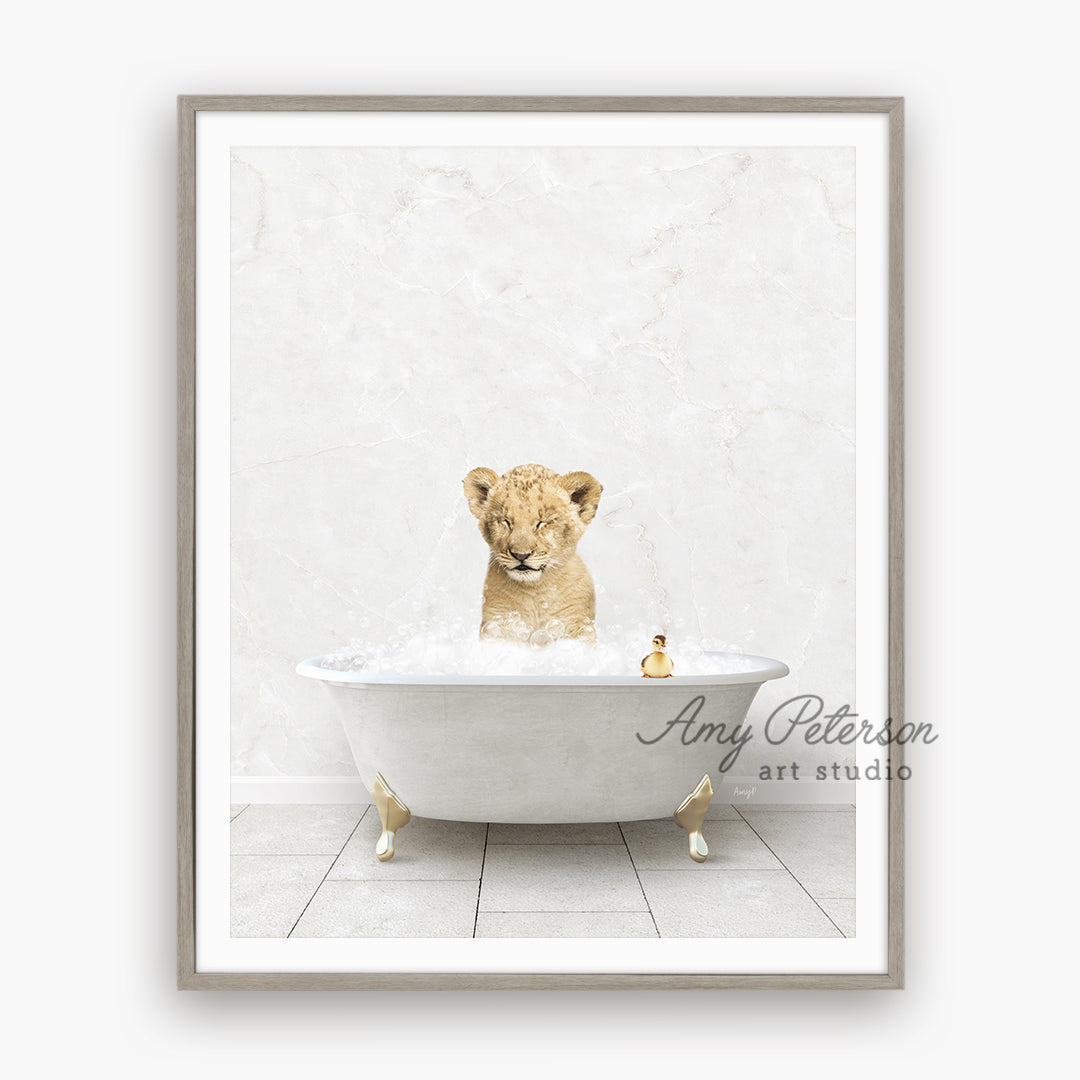 a picture of a lion cub in a bathtub