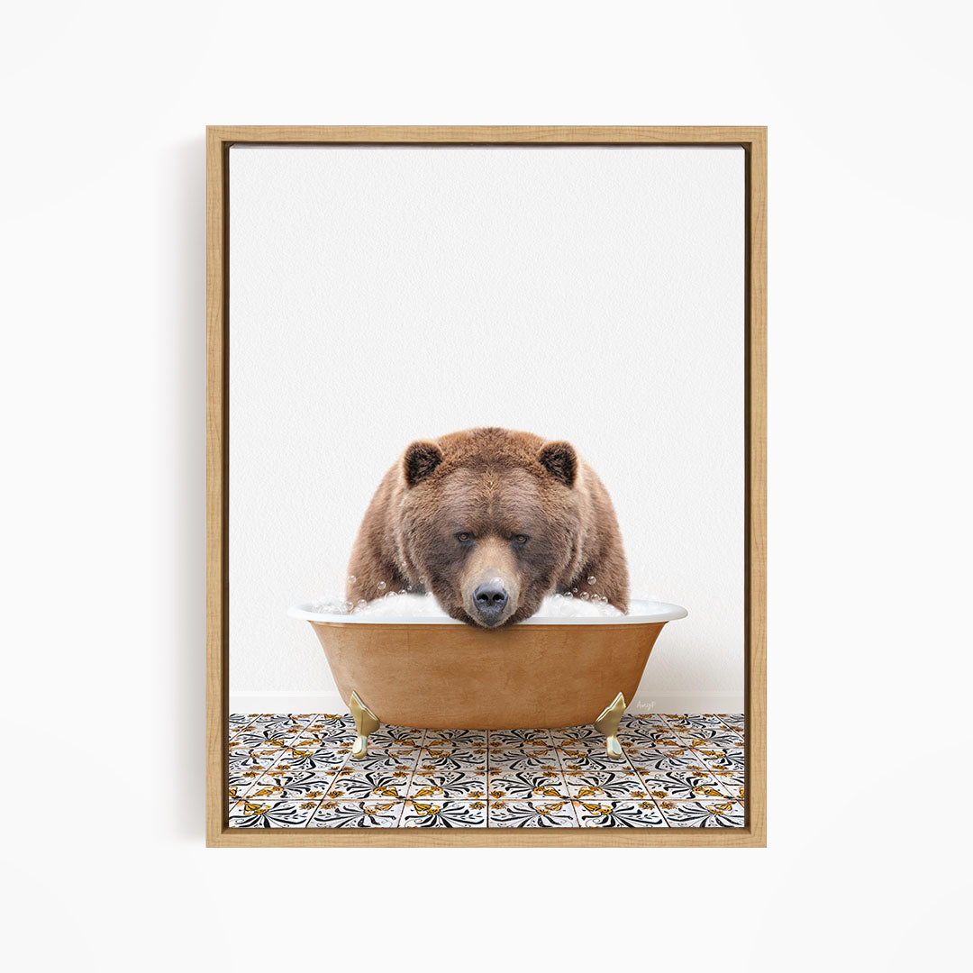 A brown bear is sitting in a bathtub filled with water, appearing to be enjoying the bath.