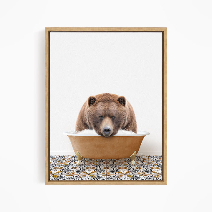 A brown bear is sitting in a bathtub filled with water, appearing to be enjoying the bath.
