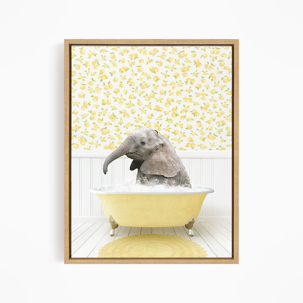 A baby elephant sitting in a yellow bathtub filled with water, surrounded by a yellow floral pattern on the wall behind it.