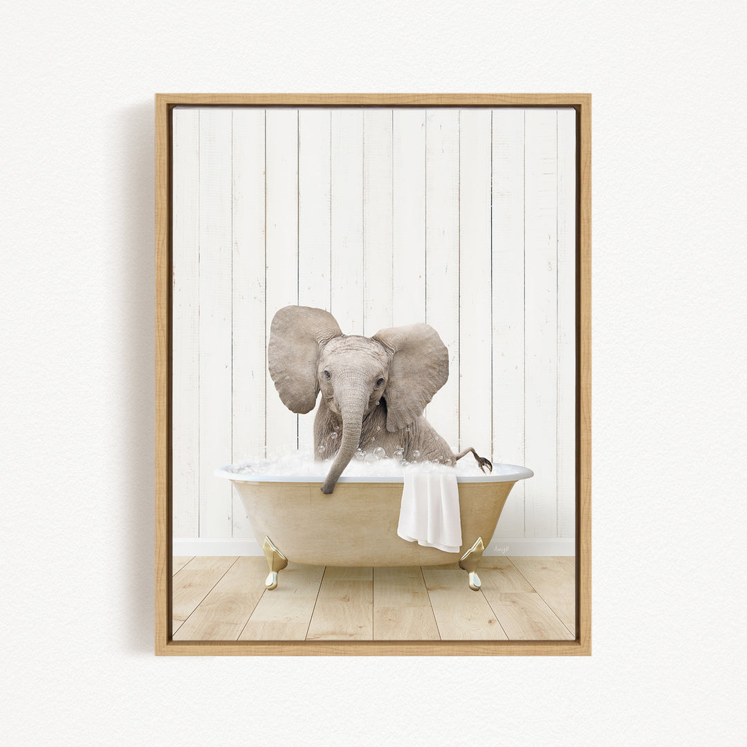 A baby elephant sitting in a bathtub filled with water, surrounded by a white wooden wall.