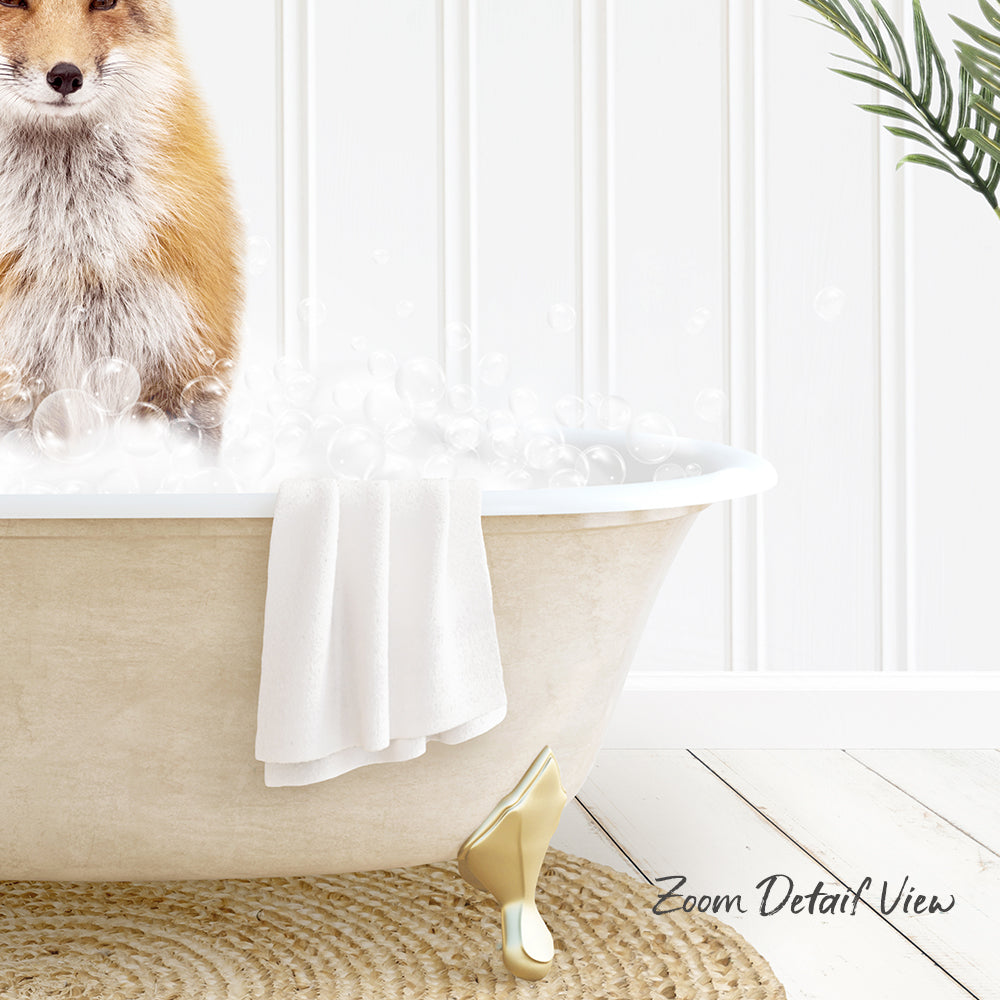 A fox is sitting in a bathtub filled with bubbles, with a towel and a plant nearby.