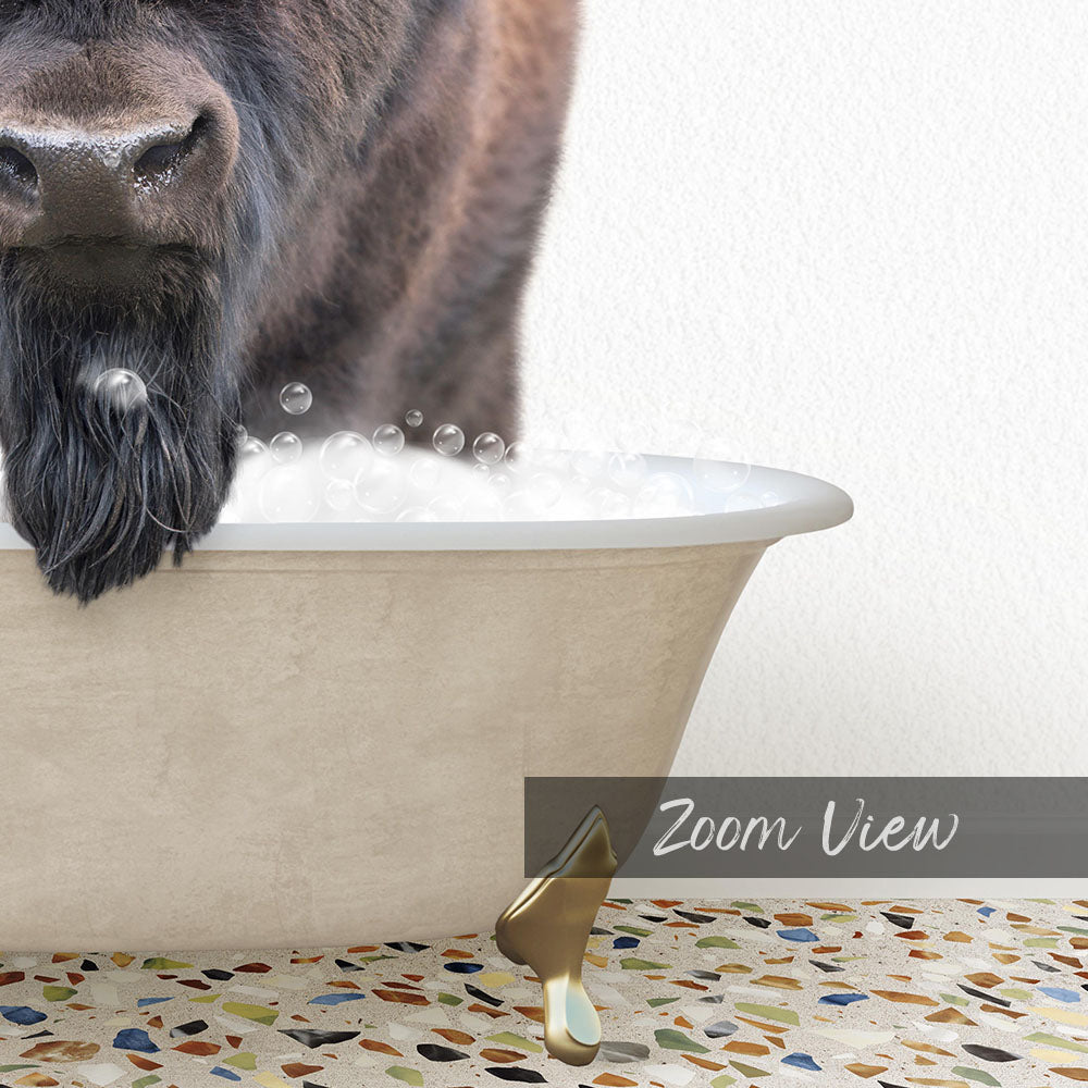A close-up of a dog's face peeking over the edge of a bathtub filled with bubbles, with a text overlay that reads "Zoom View".