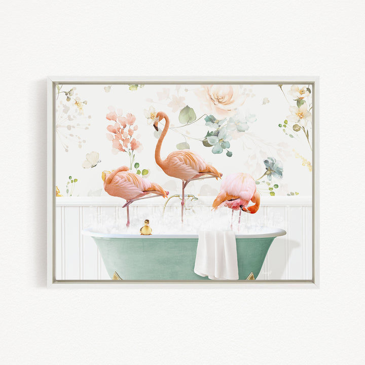 A framed image depicting three pink flamingos standing in a green bathtub filled with water, surrounded by a floral background.