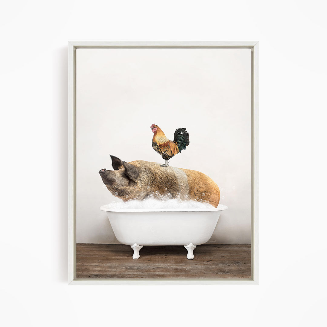 A rooster stands on a pig's back while the pig is sitting in a white bathtub filled with water.