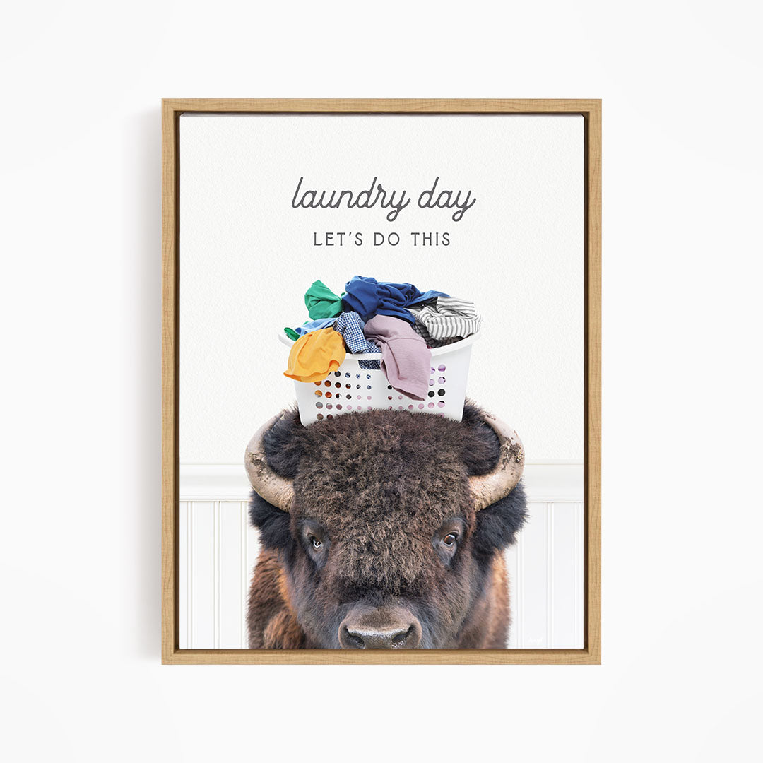 A buffalo with a laundry basket on its head, accompanied by the text "laundry day let's do this".