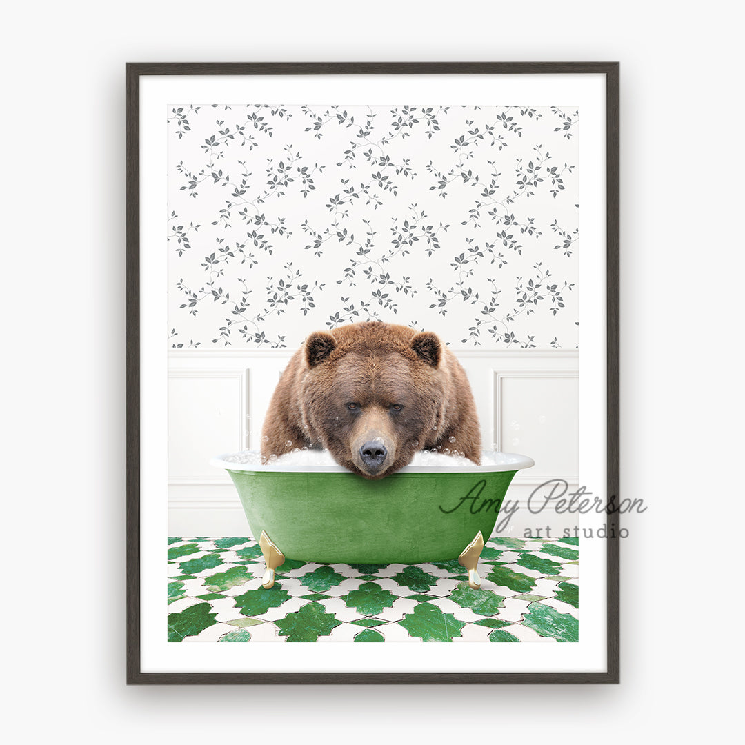 a brown bear sitting in a green bath tub