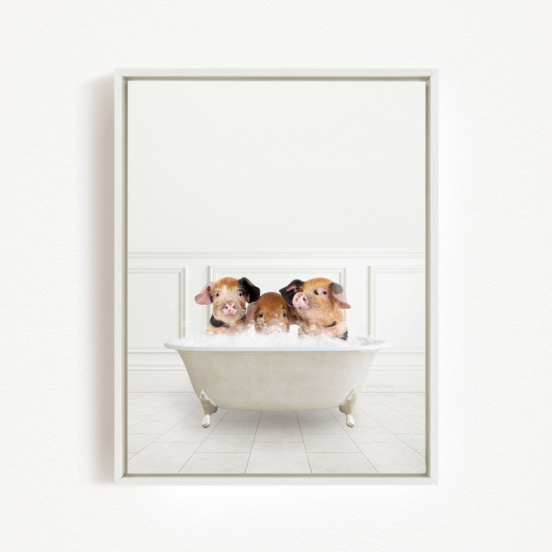 Three adorable pigs sitting in a white bathtub, enjoying a relaxing bath.