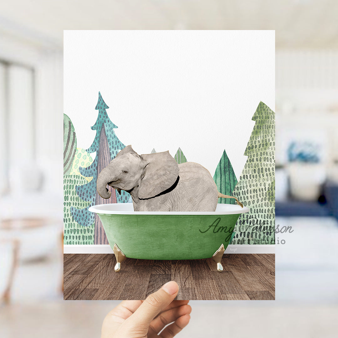 a hand holding up a card with an elephant in a bathtub