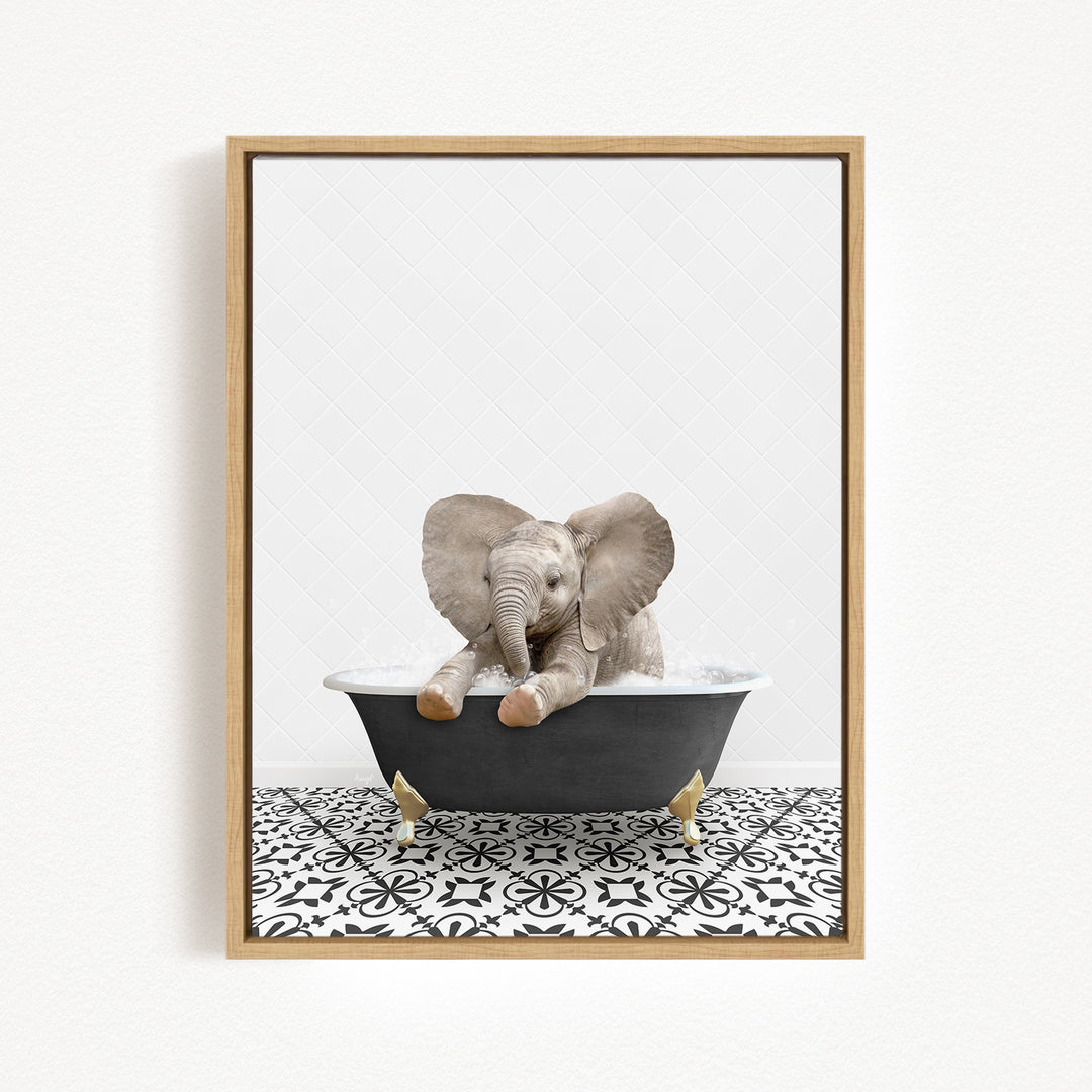 A baby elephant sitting in a bathtub filled with water, surrounded by a black and white patterned floor.