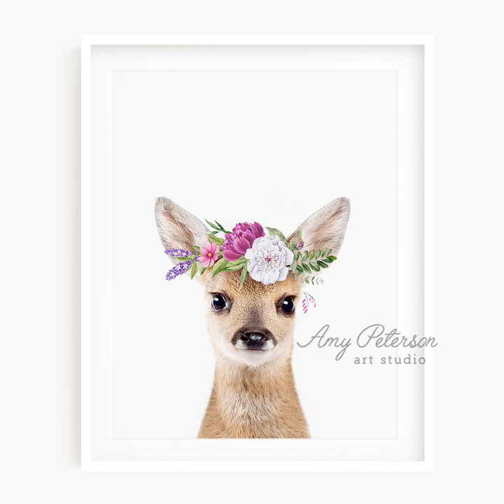 a picture of a deer wearing a flower crown