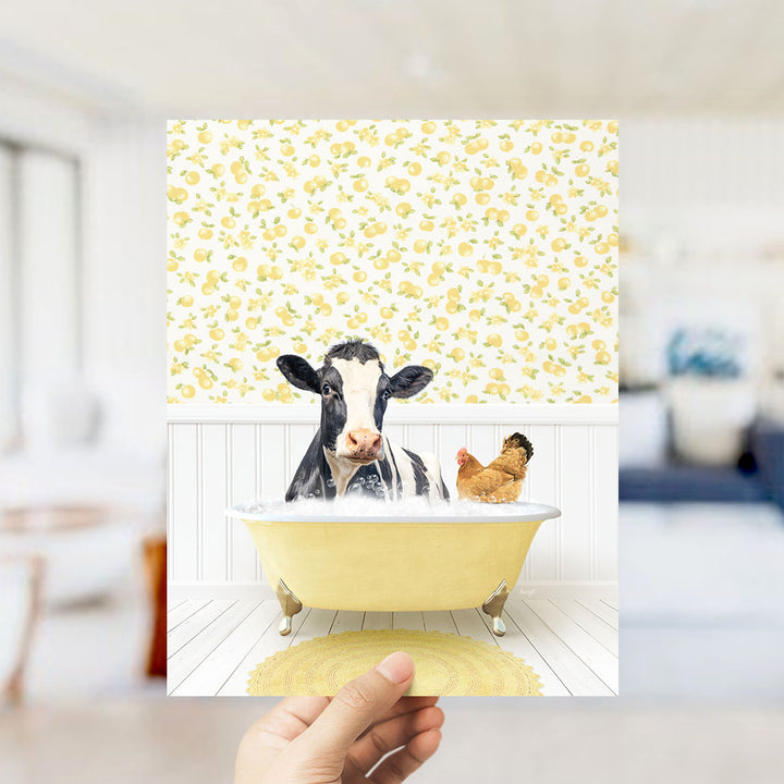 A cow and a chicken are sitting in a yellow bathtub, with a yellow floral wallpaper behind them.