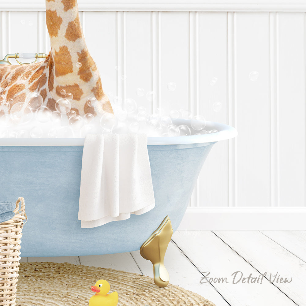 A blue claw-foot bathtub filled with bubbles, with a towel hanging on the side and a yellow rubber duck sitting in the water.