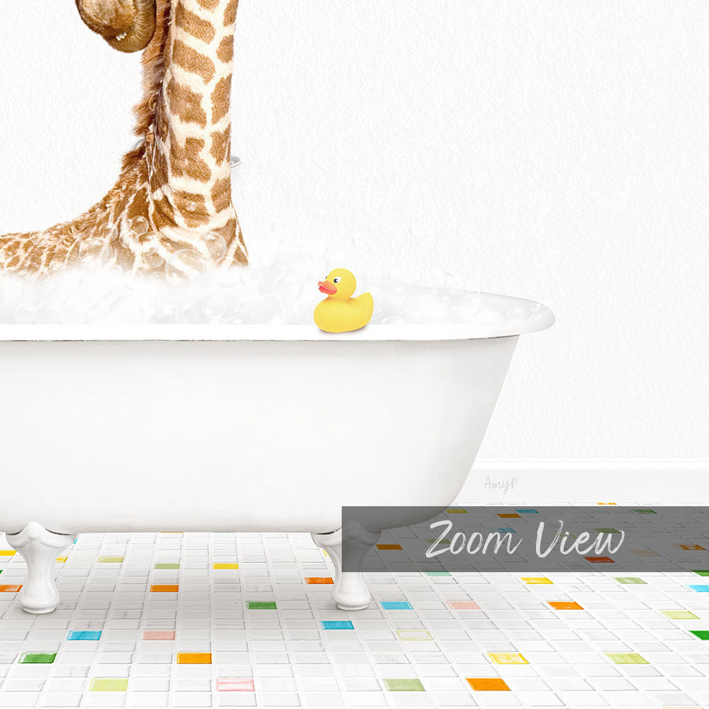 A giraffe standing in a white bathtub filled with bubbles, with a yellow rubber duck floating on the water.