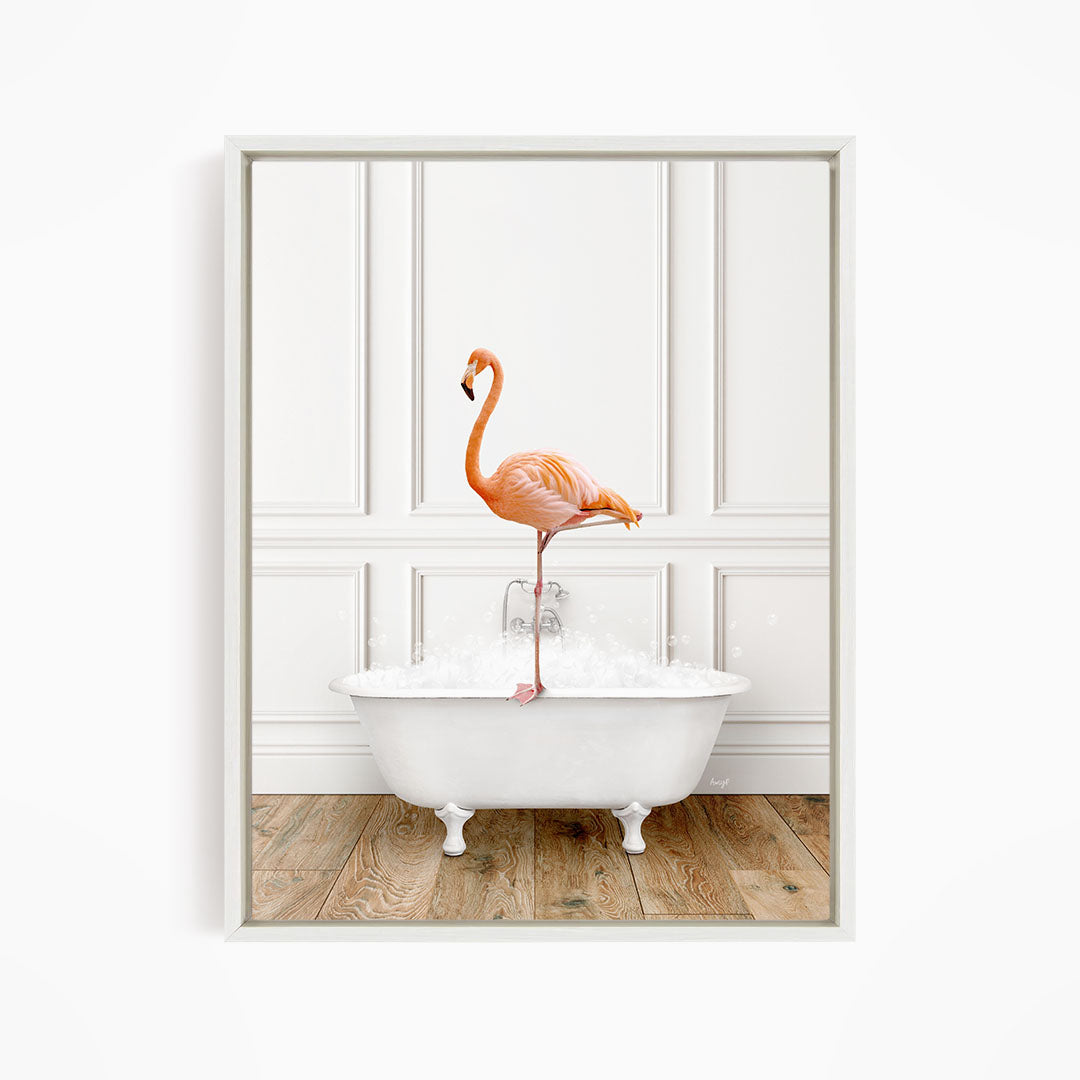 A pink flamingo standing on the edge of a white bathtub filled with water, creating a whimsical and playful scene.