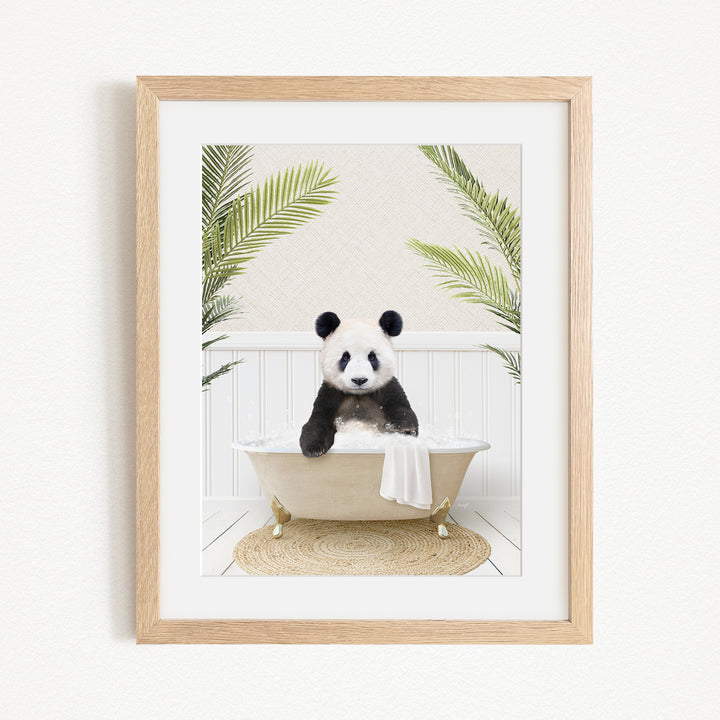 A panda bear sitting in a bathtub filled with water, surrounded by green plants.