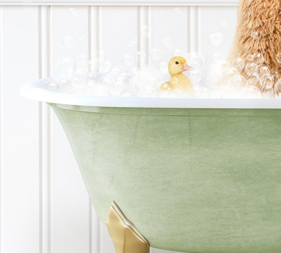 a teddy bear sitting in a bathtub filled with bubbles