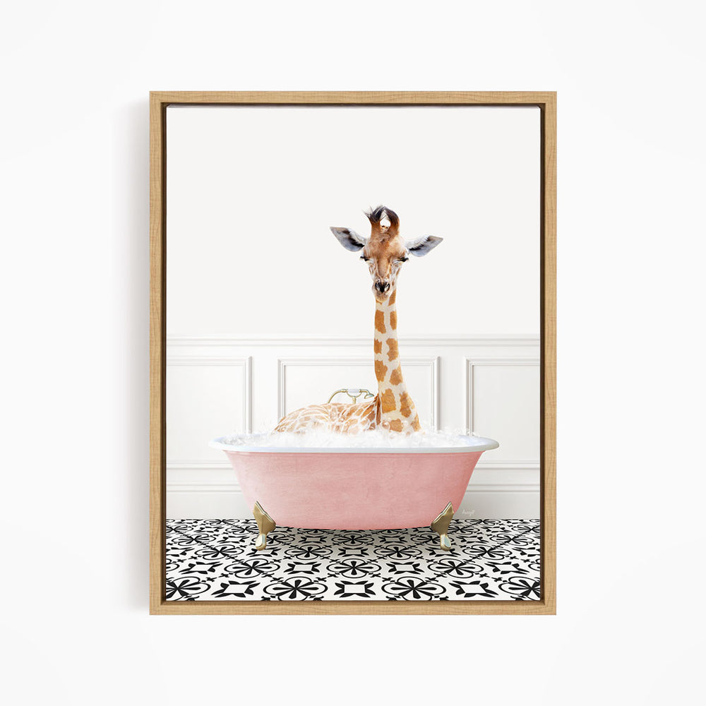A giraffe sitting in a pink bathtub filled with bubbles, surrounded by a black and white patterned floor.