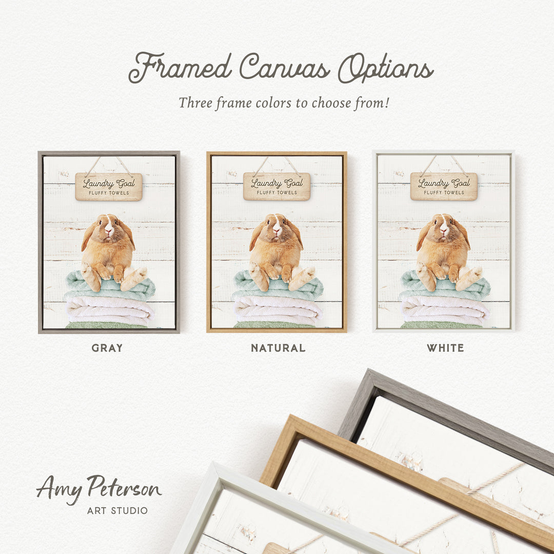 three framed canvas options for a laundry-themed artwork. The options include a gray, natural, and white frame, each with a different color and style.