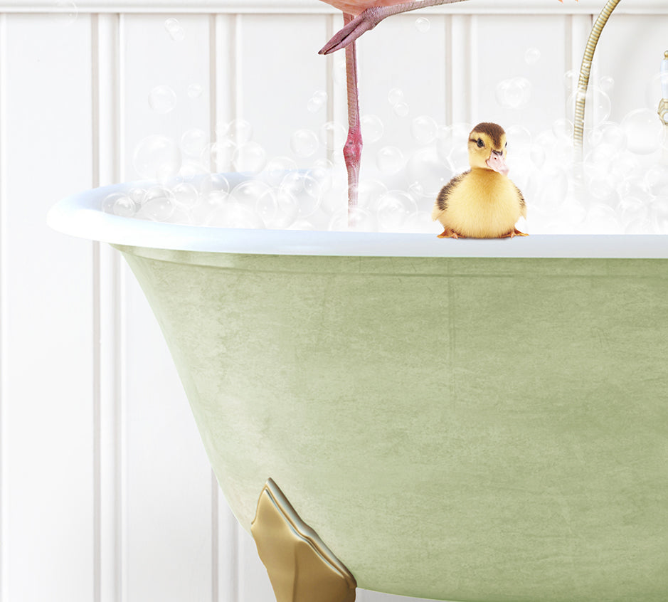 a bathtub filled with bubbles and a pink flamingo