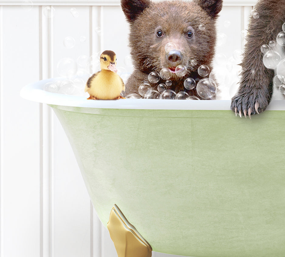 two bears in a bathtub with bubbles and rubber ducks