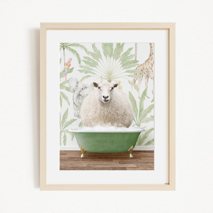 A framed image depicting a sheep sitting in a green bathtub, surrounded by a tropical wallpaper with various animals.