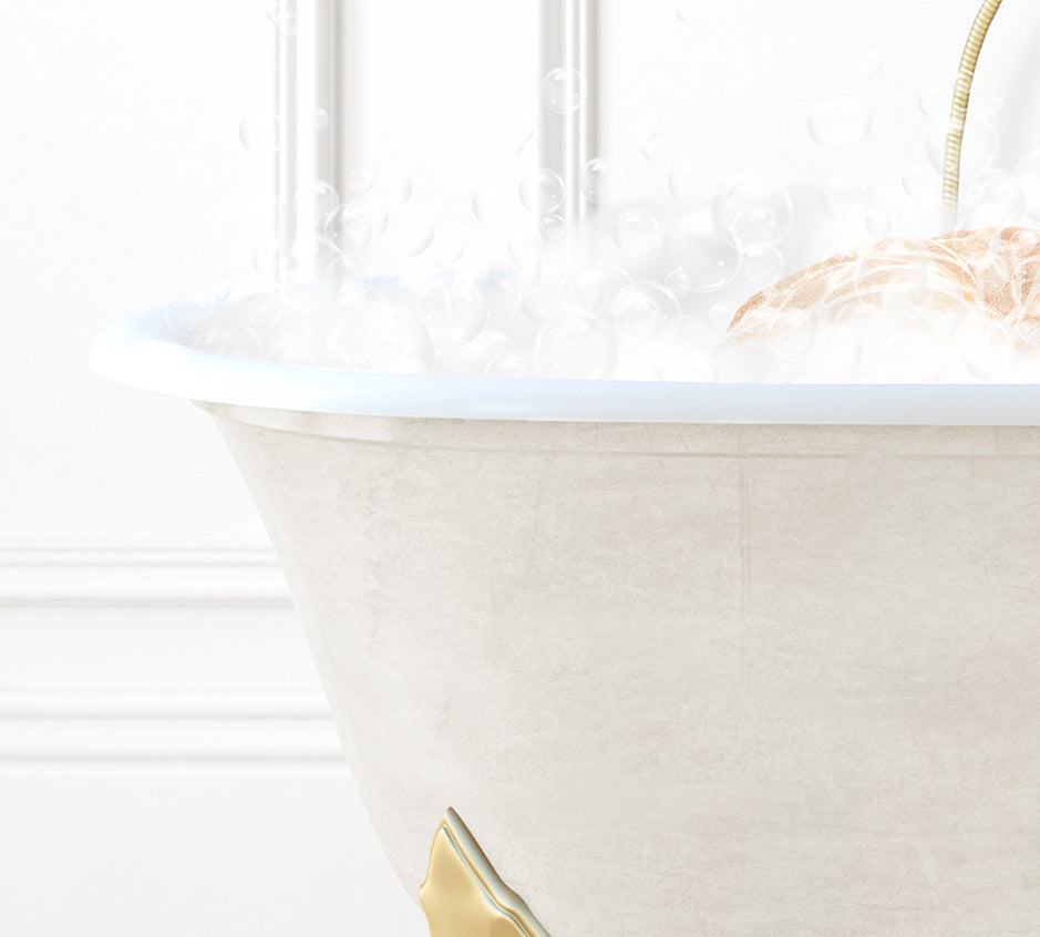 a bathtub filled with bubbles and a gold faucet