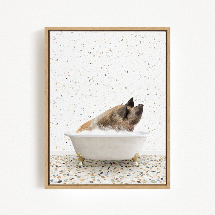 A brown pig sitting in a white bathtub filled with water, surrounded by a speckled tiled floor.