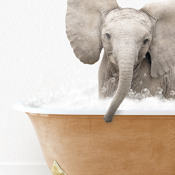 a baby elephant is taking a bath in a bathtub