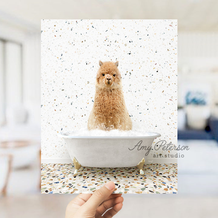 a hand holding a card with a dog in a bathtub