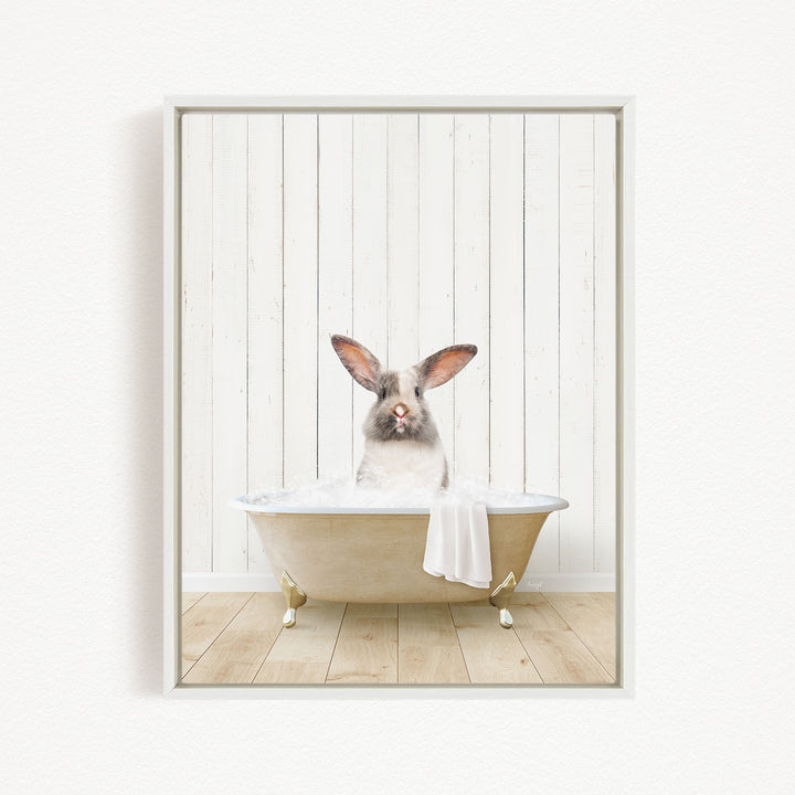 A white rabbit sitting in a bathtub filled with water, with its head above the water level.