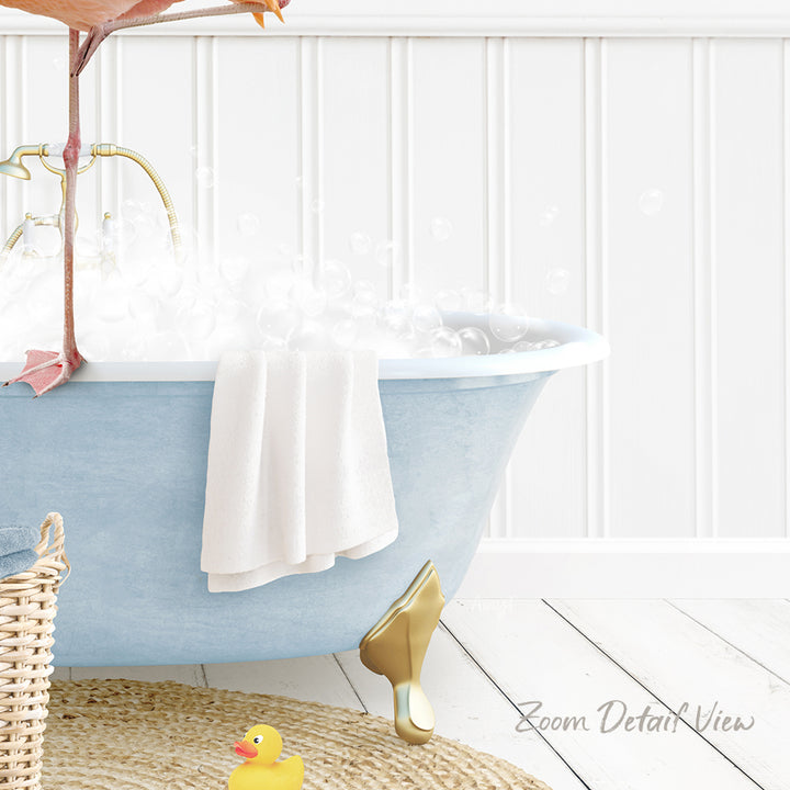 A blue claw-foot bathtub filled with bubbles, with a towel hanging on the side and a rubber duck sitting on the edge of the tub.