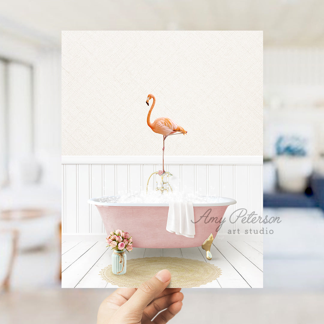 a pink bathtub with a flamingo standing on top of it